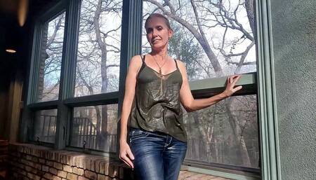 Angel Swims in Blue Jeans and Green Top