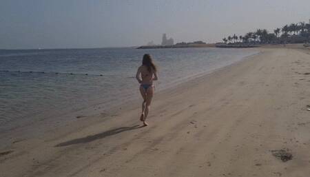 running and stretching on the beach