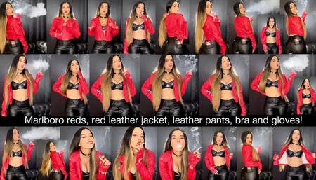 Smoking Marlboro Red in red leather jacket, red leather biker gloves black leather bra and black tight leather pants