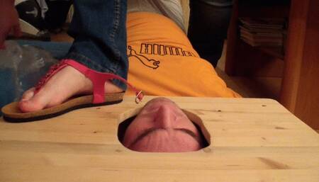 Trampling the air cushions on the slave's face