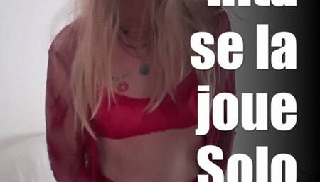 Encaged Sissy in red lingerie playing with wand