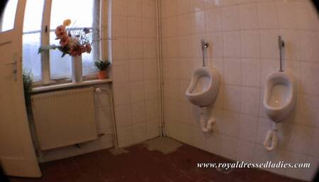 Standing pee kinky lady pees in the urinal