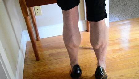 Pink Fox posing her calves by the back door, part 2