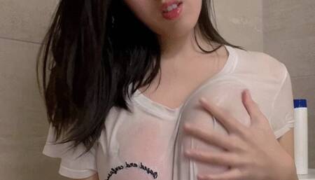 Asian Babe With Wet T-Shirt