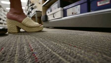 SMD trying on shoes at the store - MOV