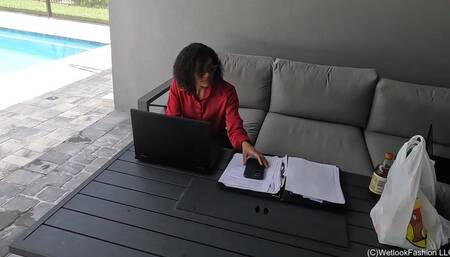 Natalie swims in a Red and Black Business Outfit