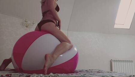 Alla hotly rides on a big beach ball and gets real pleasure from the ride!!!