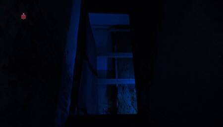 Even though this girl is chained to the wall, she can still scrub the floor