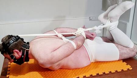 Miss M keeps a man tightly hogtied in his underwear and socks