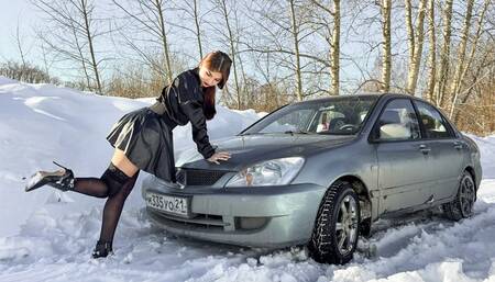 CAR STUCK Worn out tires and snow - Ellie stuck in a short dress