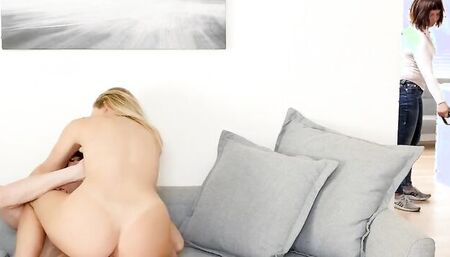 Smoking hot babe is riding her stepson's hard prick o n the couch