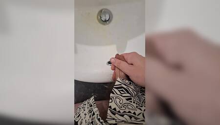 Uncut Hairy Aussie Pisses Into Sink and Tastes Pee