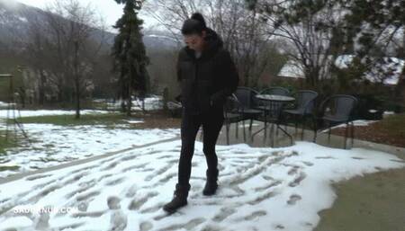 Click for preview Mistress Natasa enjoyed trampling the snow, but slave must lick the snow off his boots