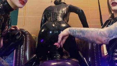 Facesitting by 3 Mistresses on latex doll slave - [720p]