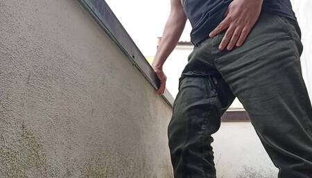 Peeing on the Balcony While Watching People Outside