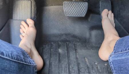 Fifi pedal pumping barefoot in blue jeans