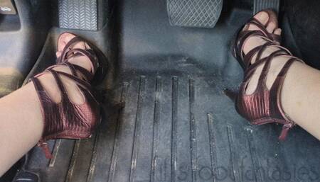 Fifi pedal pumping in red gladiator platform heels