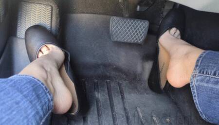 Fifi pedal pumping in black ballet flats