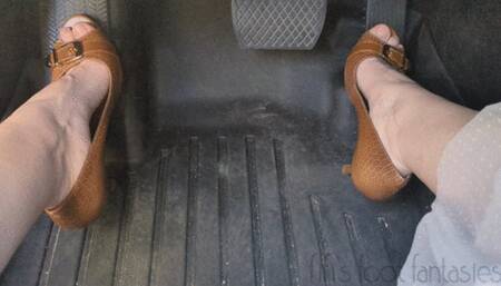 Fifi pedal pumping in open toe heels and a skirt