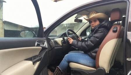 Pedal pumping of a real cowgirl with hat and cowboy boots