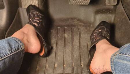 Fifi pedal pumping in slip on leather mules sandals and blue jeans
