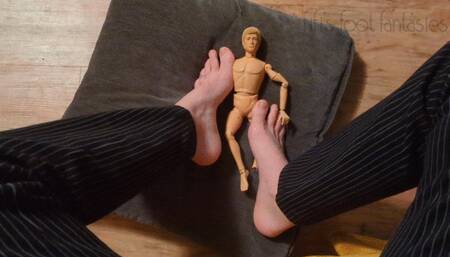 Smothering a shrunken man with my feet