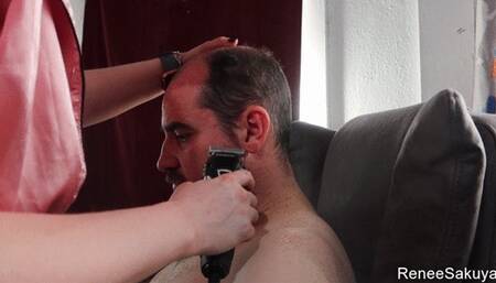 Shaving his head from multiple angles upclose 720p