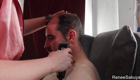 Shaving his head from multiple angles upclose
