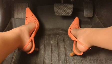 Fifi pedal pumping in pink back-strap heels with nylons