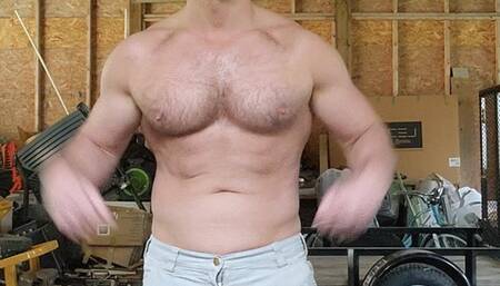 Muscle hunk pulls out his big dick