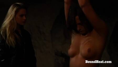 Betrayed Cargo: Young Lesbian Slave Gets her back Whipped Hard by Mistress