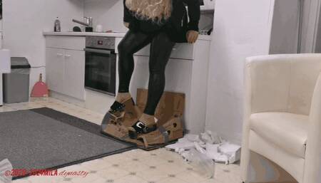 Mila tramples boxes in platform mules - topless