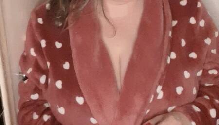 Erotic smoking on a robe, panties and bra, cork cigarette