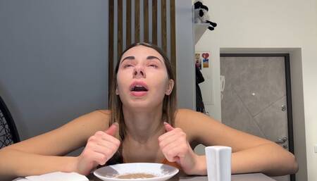 She sniffs pepper, rubs pepper on her nose and sneezes