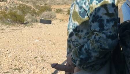 Alpha male pees in the desert rock hard