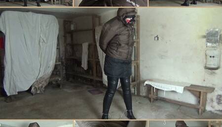 Handcuffed captive in a down jacket