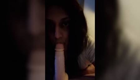 Sucking on 6" Dildo