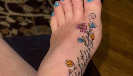 Tickling my foot with a feather