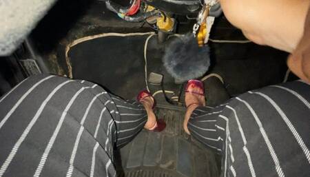 Barbara accelerates hard the barefoot beetle and her red nails