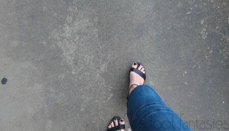 Fifi driving very fast in tight jeans with black sandal heels and black polish