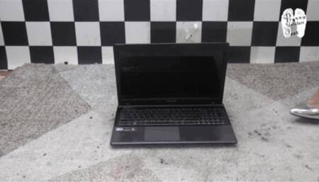 Metal Heels destroys a Laptop