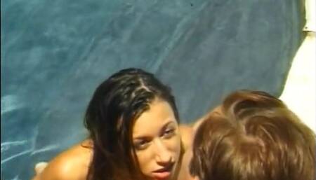 Hot couple having sex by the pool