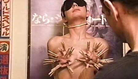 Horny dude loves putting clothes pegs on his slaves tits