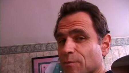 Hot blonde bondage in a red fetish suit