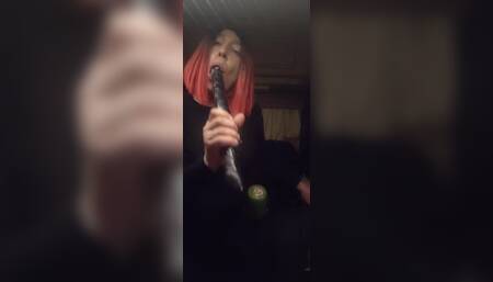 Sucking on Doubledildo