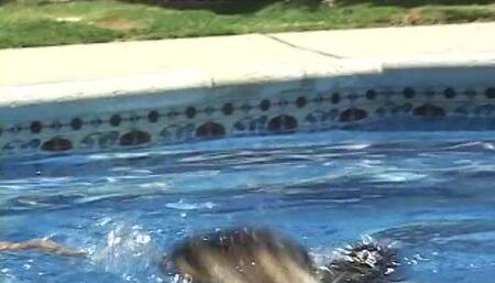 Sexy cutie having oral sex on the pool with lesbian friend