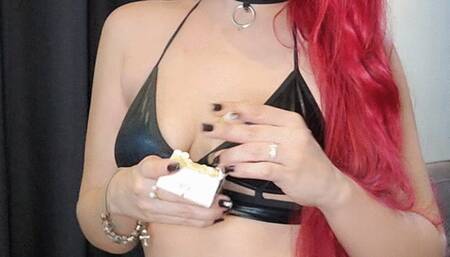 Smoking cork in black lipstick, leather and high heels - full body