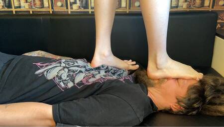 Barefoot facekicking, facestomping and trampling on the sofa