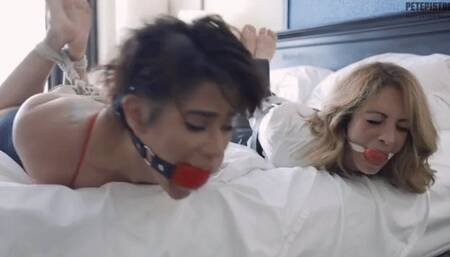 Sexy moaning secretary Enchantress Sahrye and Alba Zevon hogtied and ball gagged in Slow MOtion