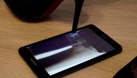 samsung tablet crushing under my black louboutin high heel stilettos